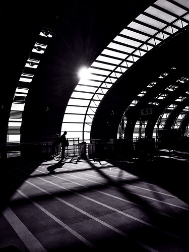 windows light shadow blackandwhite bw sun paris france scale monochrome lines sunshine contrast carpet person blackwhite frames airport waiting angles arches terminal charlesdegaulle patience volume cdg iphone blazing silhopuette