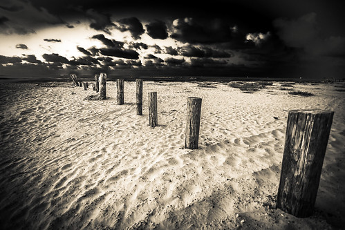 Pilings On The Beach by Mabry Campbell, Mabry Campbell Photography 
<a href="http://mabrycampbell.photoshelter.com" rel="nofollow">mabrycamp