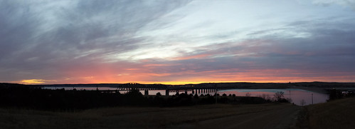 bridge blue sunset red reflection yellow clouds missouririver chamberlainsd lakefranciscase southdakotarailroad