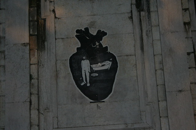 Pasted-paper closeup at Rua de O Século, Lisboa
