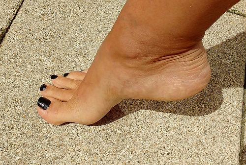 Foot, arch, black polish