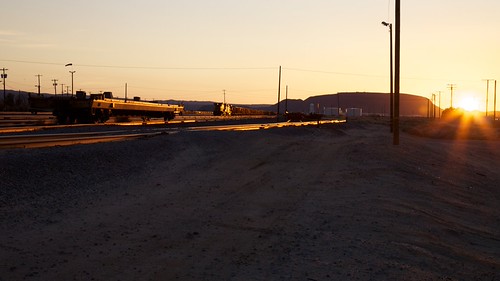 Sun setting behind the UP Siding in Yermo, CA by string_bass_dave, UP Consist ready to roll.

I was driving through Yermo, CA just as the sun was beginning to set.  I 