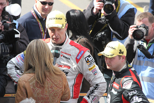 ITV's Louise Goodman interviews Matt Neal after his second place in BTCC at Donington Park in April 2012