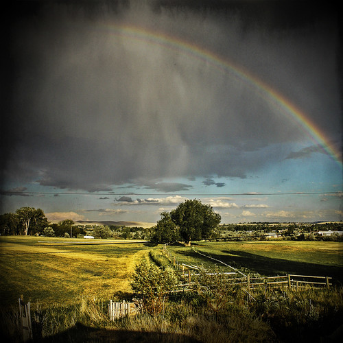 wyoming rainbow lander fremontcounty summer july backyard field grass clouds thunderstorm