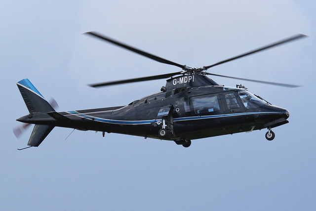 G-MDPI - 1987 build Agusta A109A, departing from Aintree after the 2012 Grand National