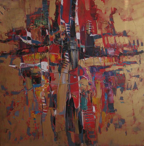Crossing red and blue linear marks on golden paint