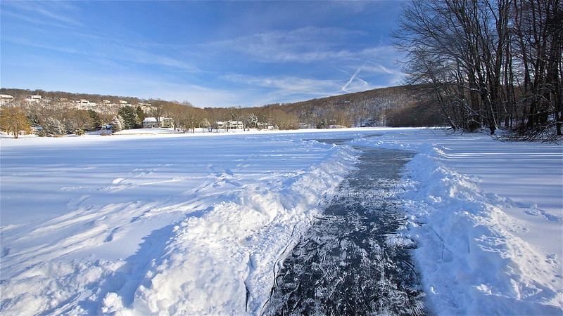 Snow-covered Pierrepont Lake in winter