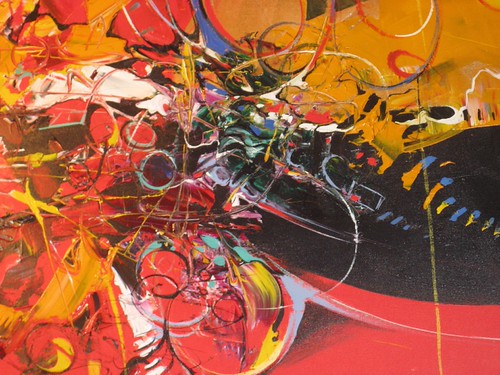 Sweeping curved outlines in red, yellow and black
