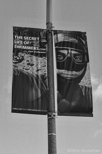 One of The Secret Life of Swimmers Banners - Culver City - Nikon N55 - AF Nikkor 50mm F/1.8 D - Delta 100