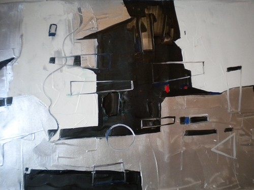 Broad black block with fine outlines on grey