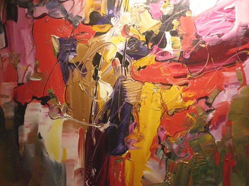 Sweeping white and ochre patches over red