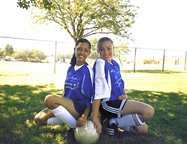 Two soccer girls posing in Cielo Vista Park