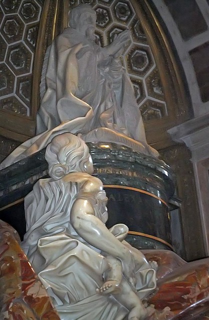 Another view of Charity with child in arms by Giuseppe Mazzuoli on the monument to Pope Alexander VII