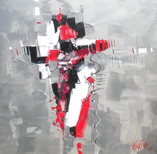 Sharp red and black geometry over grey