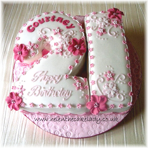 21st shaped pink flowers cake