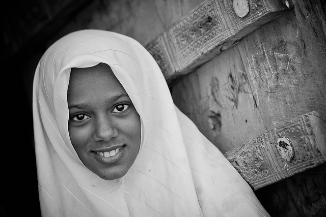 portrait of a beautiful little girl with in head the chador in the town of Seiyun, Hadramawt, Yemen