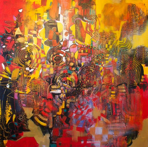 Dense curved marks and figures on yellow and red