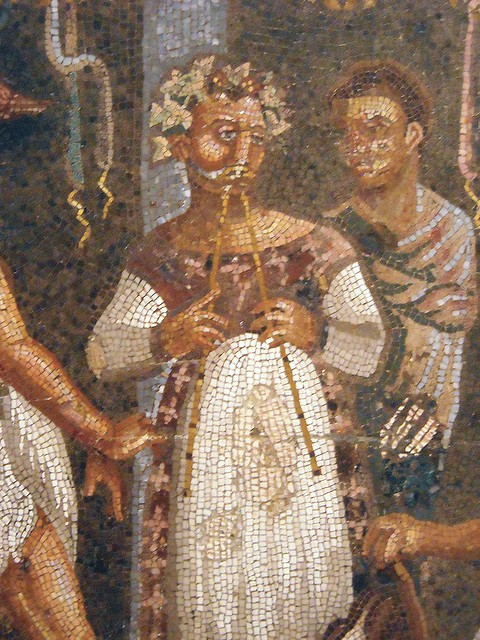 Flute-player - mosaic from the House of Tragic Poet at Pompeii - Naples Archaeological Museum