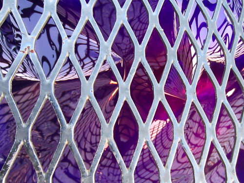 abstract color reflection colors lines metal closeup grid lights design shiny pattern shine purple random top under violet cage overlay wiggly diagonal plastic reflected repetition layers psychadelic crisscross wavy ravens druidhill druidhillpark moorishtower outerspaces outerspacesbeyondbaker