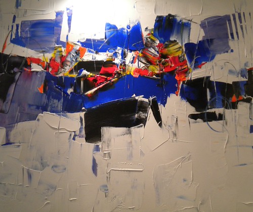 Horizontal blue and black strokes with bright colour patches