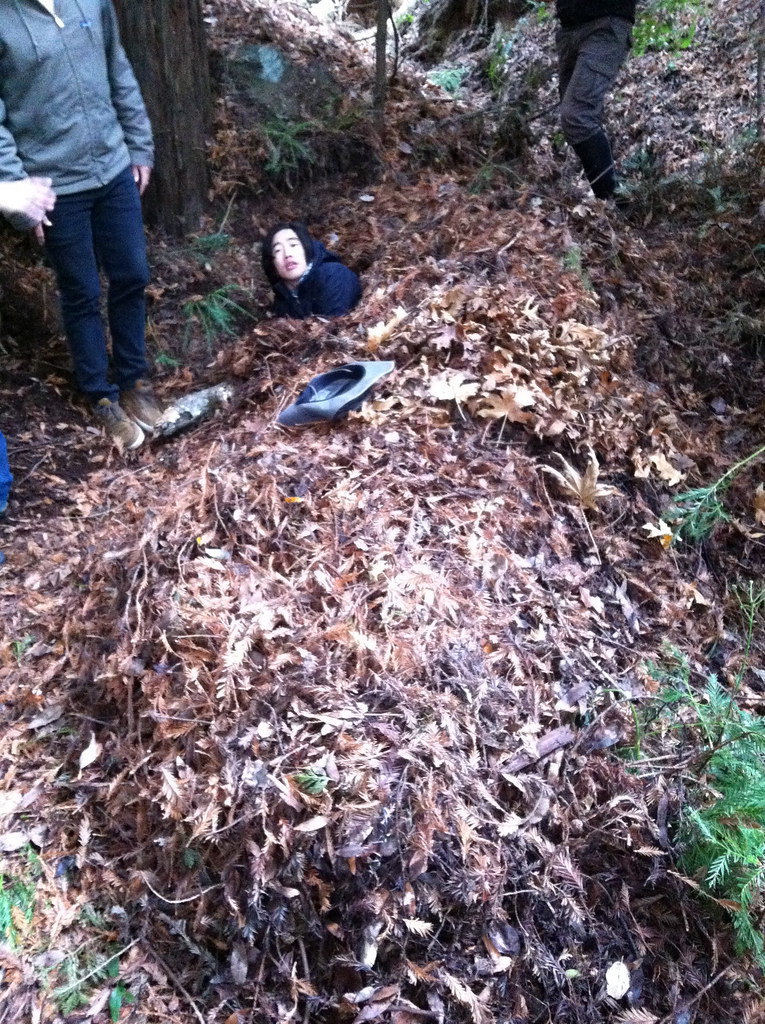 Stan in a debris hut