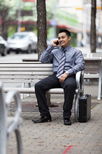 Hispanic Businessman - Chatting on cell phone