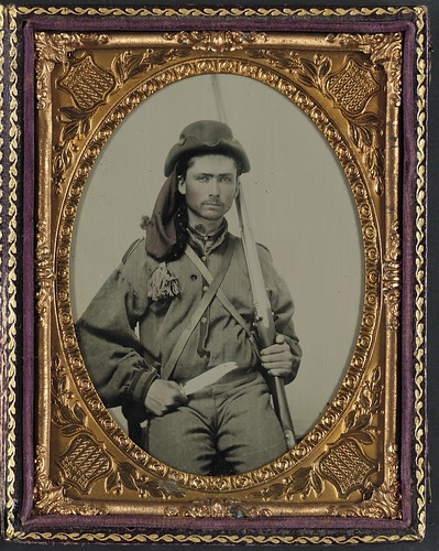 [Unidentified soldier in Confederate infantry uniform with musket and Bowie knife] (LOC) | by The Library of Congress