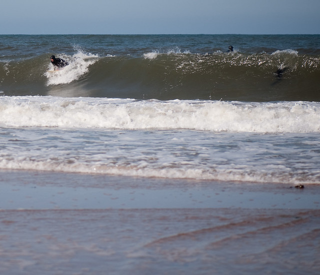 Surfing at Cambo Sands