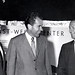Vice president Richard M. Nixon smiles broadly as UH president Laurence H. Snyder, left, and UH administrative vice president William Wachter look on. Nixon visited Manoa on August 3, 1960 to view the scale model of the proposed East-West Center.
