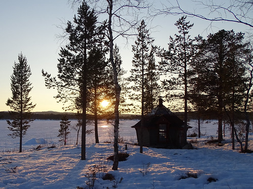 sunset snow tree hut