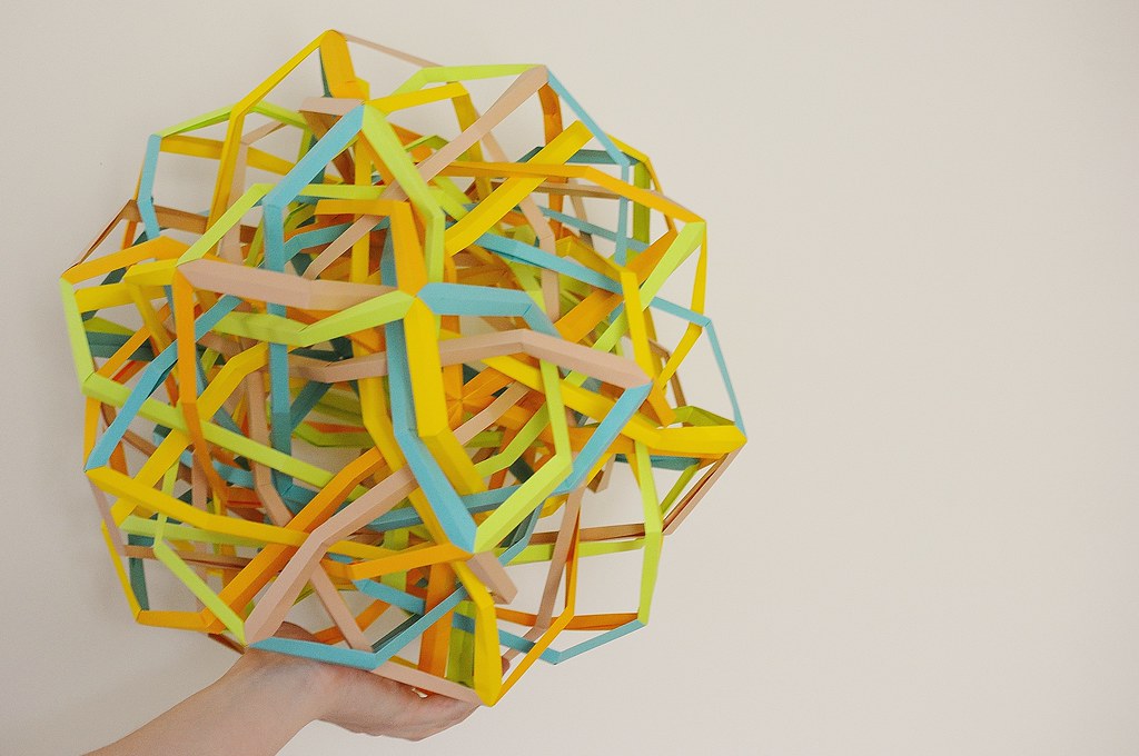 “Ultrasphere” Five Interlocking Wrinkled Tetrahedrically Triaugmented Hexahedrically Twisted Augmented Tetrahedra (Byriah Loper)