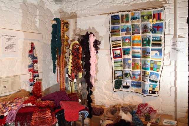 I have photos back from the Jersey Textile Showcase 2012. Our 'Your Local Landscape' Blanket has been on exhibition and afterwards it was sold to raise money for Mencap a very worthy cause. We raised £95.00!