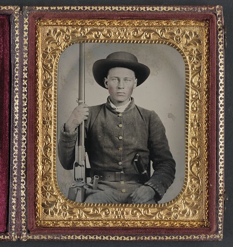 [Unidentified soldier in Confederate uniform with Colt Revolving rifle and D-Guard Bowie knife] (LOC) | by The Library of Congress
