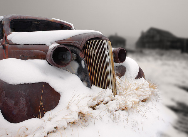 MC219 - 1937 vintage Chevrolet master deluxe coupe covered in snow, Bodie State Historic Park, California, USA