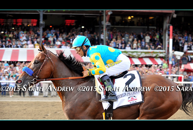 American Pharoah and Victor Espinoza, first time by in the Travers