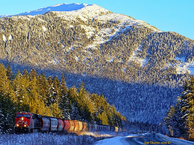 CN # 2930 leads a long west bound train of grain hoppers & containers over the Skeena Subdivision bound for the port of Prince Rupert - 5 December 2016 [© WCK-JST]