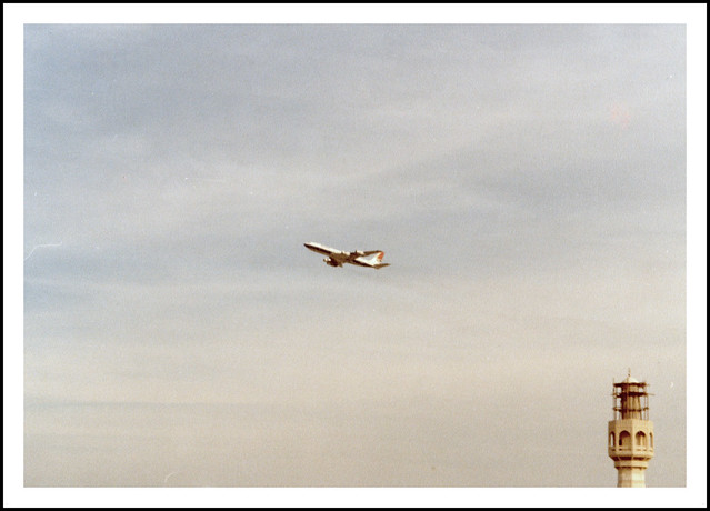 Historic photo ( although blurry ) showing a British Airways Boeing 707 climbing out from Doha - circa early 1980's