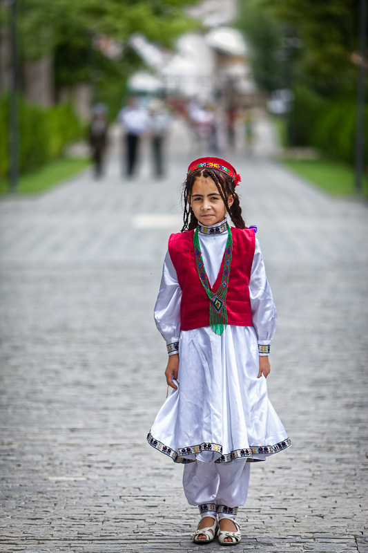 Happy Pamiri girl in traditional dress