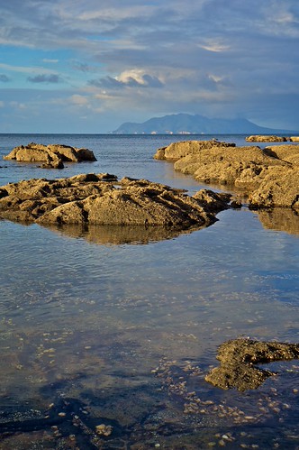 _PIX0003 by Rolf Siggaard, Little Barrier Island in the horizon. Beautiful autumn sunset.beach landscape rocks horizon valhalla