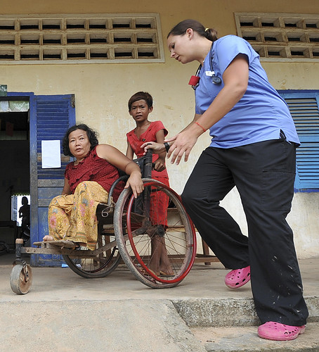 Medical civic action project - assists a local patient in a wheel chair | by U.S. Indo-Pacific Command