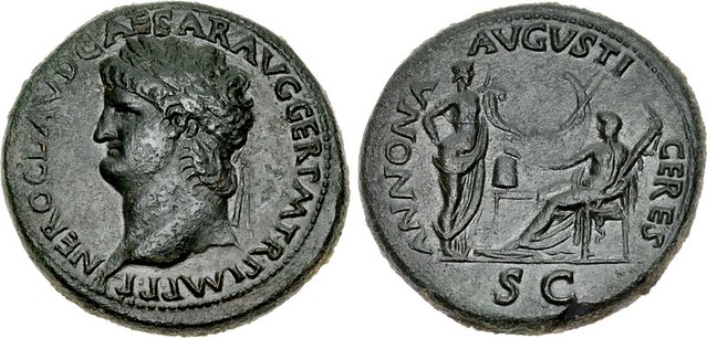 Nero. AD 54-68. Æ Sestertius (35mm, 29.17 g, 6h). Lugdunum (Lyon) mint. Struck circa AD 65. Laureate bust left; globe at point of bust / Annona standing right, holding cornucopia, facing Ceres seated left, holding grain ears and torch; between them, modiu