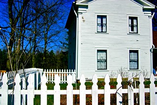 White picket fence of the DeLano Homestead