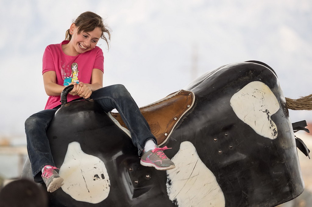Mechanical bull riding at Farm and Ranch Museum in New Mexico