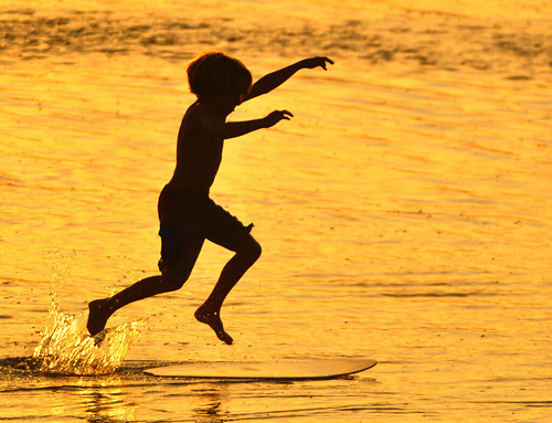 summer beach silhouette golden colorful child play surfing pacificocean shore splash laplaya delmar sandiegocounty