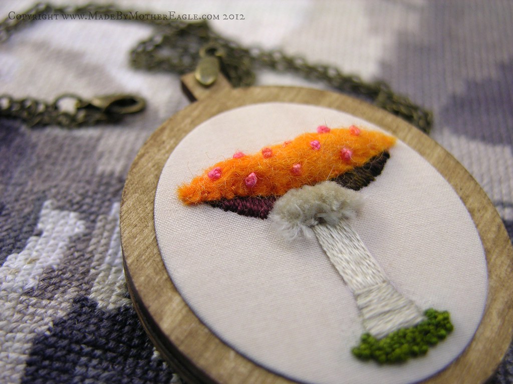 Hand embroidered mushroom pendant