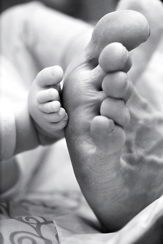 Baby's foot to father's foot | father and baby | Olya Batishcheva | Flickr