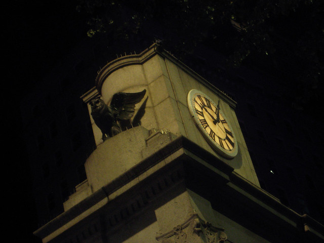 Herald Square Clock Owls at Night with Green Glowing Eyes NYC 8914