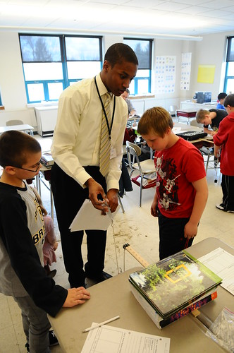 Title UMass Lowell students gain firsthand experience teaching at Sullivan Middle School in Lowell.