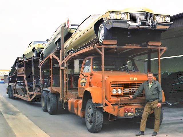 A transporter full of brand new 1972 GM luxury cars