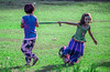 Children play in the garden by Emraan's Photography